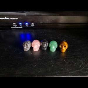 Lot of 5 crystal skulls.